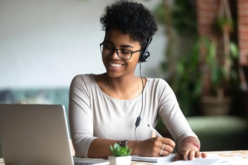 Woman assisting hosting clients remotely